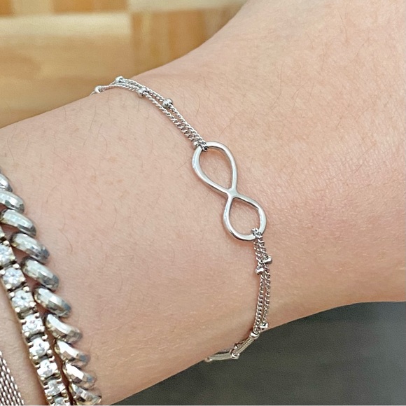 Silver-tone Dainty Infinity Bracelet - Picture 3 of 9